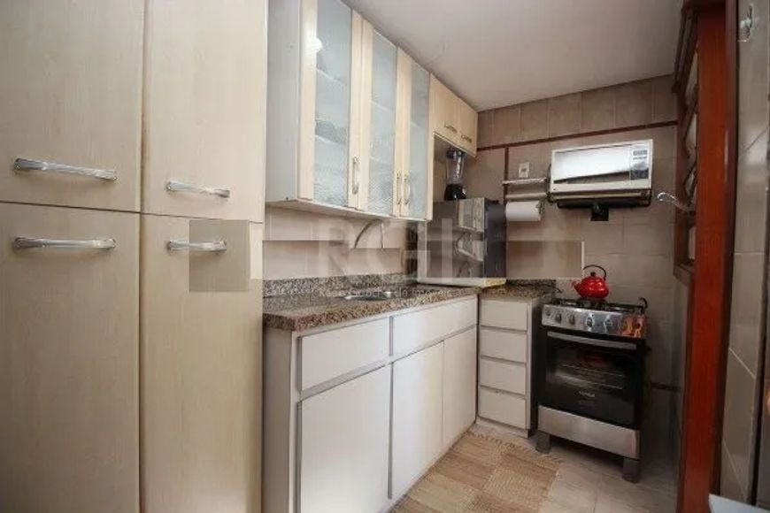 Ótimo apartamento de um dormitório e uma suíte, living para dois ambientes com janela panorâmica e c