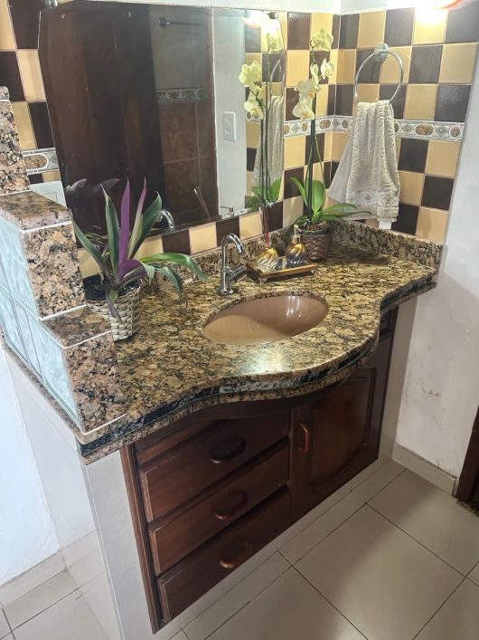 Casa com 4/4 e 3 vagas de garagem