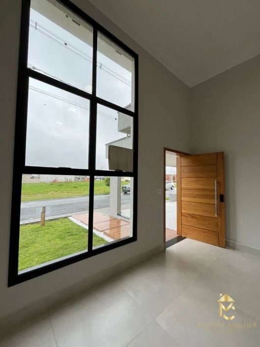 Casa com 3 dormitórios à venda por R$ 795.000 - Guedes - Tremembé/SP