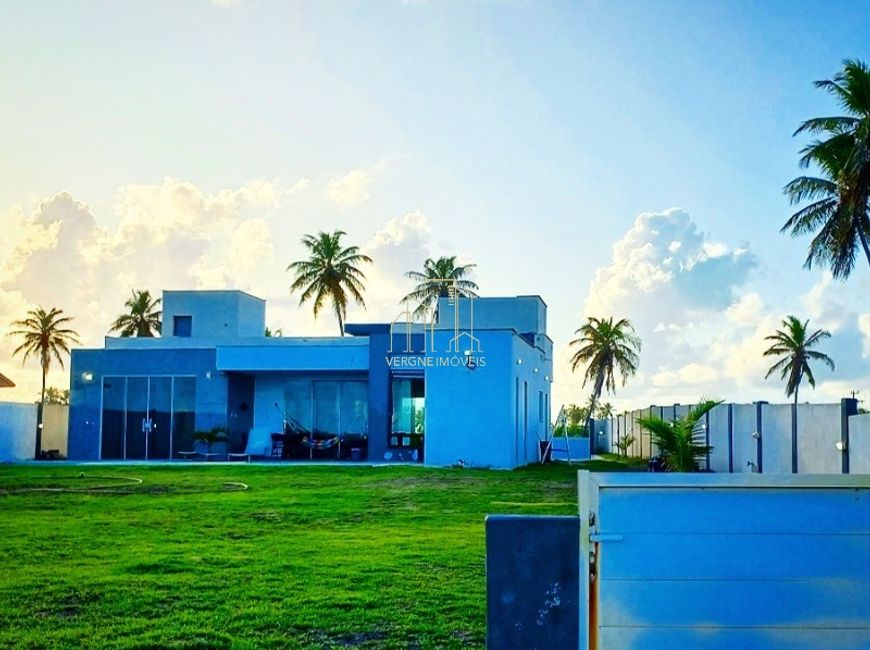 Espetacular casa em condomínio fechado pé na areia com quatro quartos e área gourmet a venda em Saui